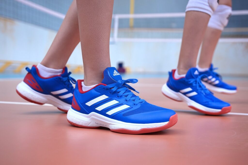 Adidas Volleyball Shoes Worn By Girls Vibrant Colors And Unique Design Details